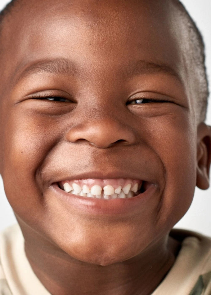 Visage enfant sourire association